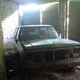 Illustration for article titled This Abandoned Soviet Sub Base Is Hiding Amazing Army Truck Barn Finds